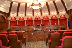The Supreme Court courtroom in the basement of Library of Congress in Washington, DC was the inspiration for the design.