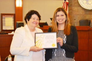 District Court Chief Judge Betsy Gonzalez with Mary Bacon the Legal Aid Center of Southern Nevada pro bono volunteer of the month for June.