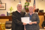 Jeanne Muchow CASA of the month with Judge Frank Sullivan who presides over the CASA program.