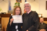 Roberta Ainslie CASA of the month with Judge Frank Sullivan who presides over the CASA program.