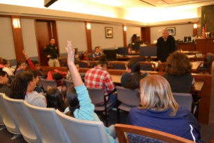 After fourth graders sat through his criminal calendar, Judge Doug Herndon took their questions.